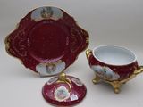 three pieces of porcelain ware are sitting on a white surface