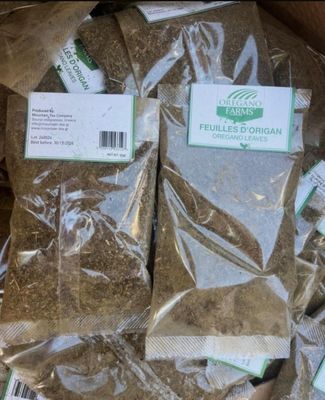 a box full of herbs that are sitting on a table