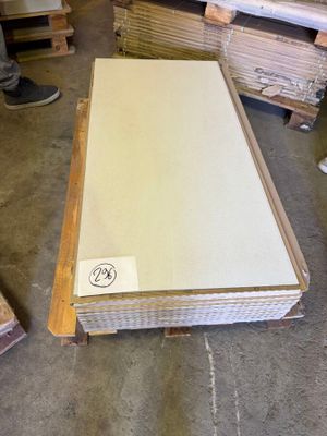 a lot of boxes and boxes of wood in a warehouse