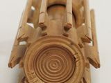 a wooden toy train that is sitting on a table