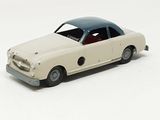a toy car that is sitting on a white surface
