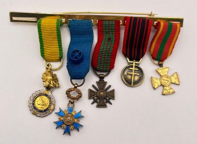 many medals and medals hanging on the wall
