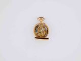 an image of a gold pocket watch on a white surface