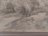 dessin représentant un paysage, encadré et accroché au mur