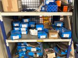 many boxes and boxes on the shelves in the garage
