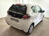 a white car that is parked in a garage