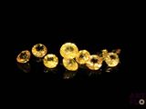 yellow sapphires on a black background