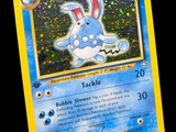 une image représentant une carte Pokémon sur laquelle figure un lapin bleu et blanc