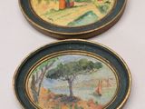 deux tableaux ovales représentant un paysage avec des arbres et une maison