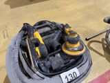 yellow and black tools are sitting on the floor in a room