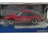 red toy car in a box on a white background