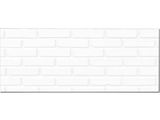 un mur de briques blanches orné d'une bordure noire
