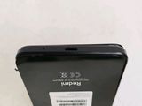 a close up of the back of a cell phone with a sticker on it