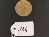 a close up of a coin with a tag attached to it