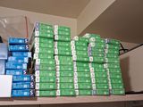 a shelf with many boxes and a blender on it