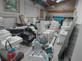 a room with a lot of boxes and a fire extinguisher