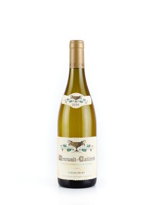 la bouteille de vin blanc est posée sur une surface blanche