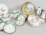 many different types of china on display on the table