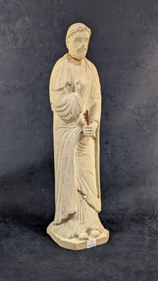 une image représentant la statue d'un homme tenant une canne
