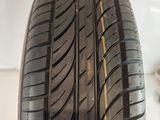 a close up of a tire on a white surface