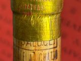 a close up of a bottle of wine with a label on it