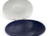 an image of a white and blue plate sitting on top of each other