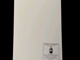 a close up of a piece of paper on a black background