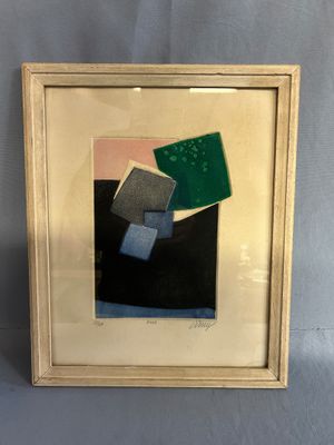 framed picture of a painting of a green square and a blue square