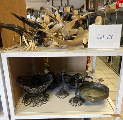 a shelf with a lot of items on top of it