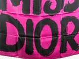pink dior scarf with black letters on it