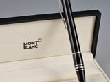 a pen that is sitting in a box on a table