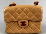 chanel tan quilted lambskin flap bag