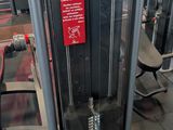 an image of a gym room with equipment for people to use