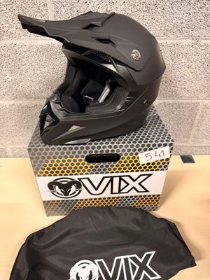 a helmet and a bag sitting on a table