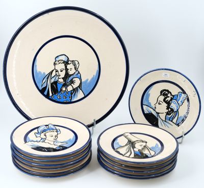 four plates with a picture of a man and a woman on them