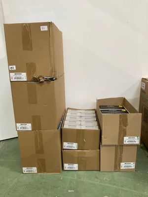many boxes that are sitting on the floor in the room