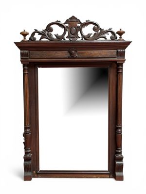 Important MIROIR en bois vernis de style renaissance, le fro…