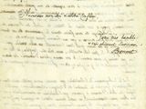 un gros plan d'un morceau de papier sur lequel on a écrit