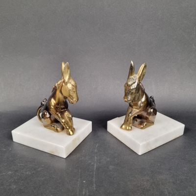 pair of antique brass donkey bookends on marble bases