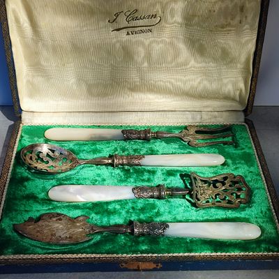 a box with a set of silverware in it