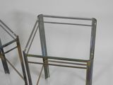 pair of chrome and glass side tables with glass tops