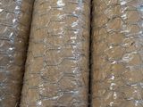 several rolls of plastic wrapped in plastic wrap on top of a table