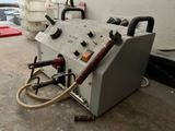 a machine that has a hose attached to it