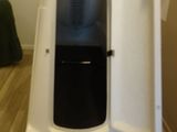 a large white machine that is sitting in a room