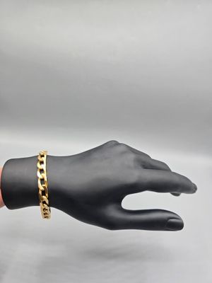 Bracelet gourmette à large mailles en or jaune 750°°.