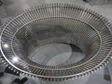 a circular metal object that looks like a spiral staircase