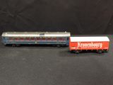 a toy train that is sitting next to a toy truck