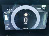 the dashboard of a car with a digital display showing the speed of the car
