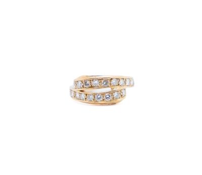 a close up of a gold ring with diamonds on a white background