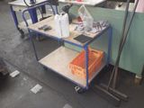 a cart that has a bunch of items on it